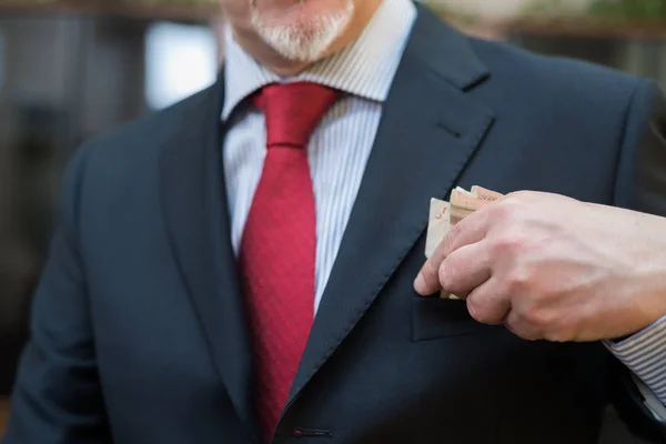 Man taking a bribe — Stock Photo, Image