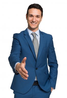 bir el sıkışma veren işadamı
