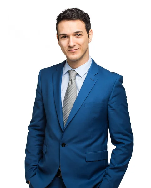 Businessman standing and looking at camera — Stock Photo, Image