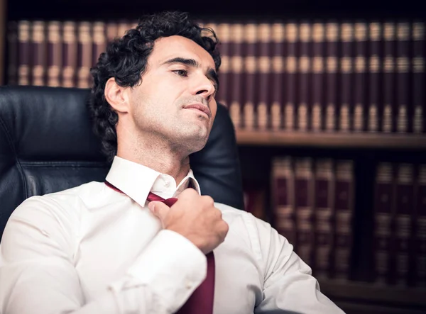 Businessman relaxing in office — Stock Photo, Image