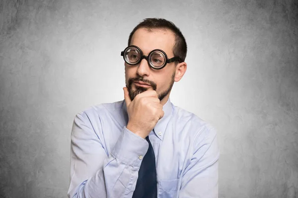 Nerd thinking about something — Stock Photo, Image