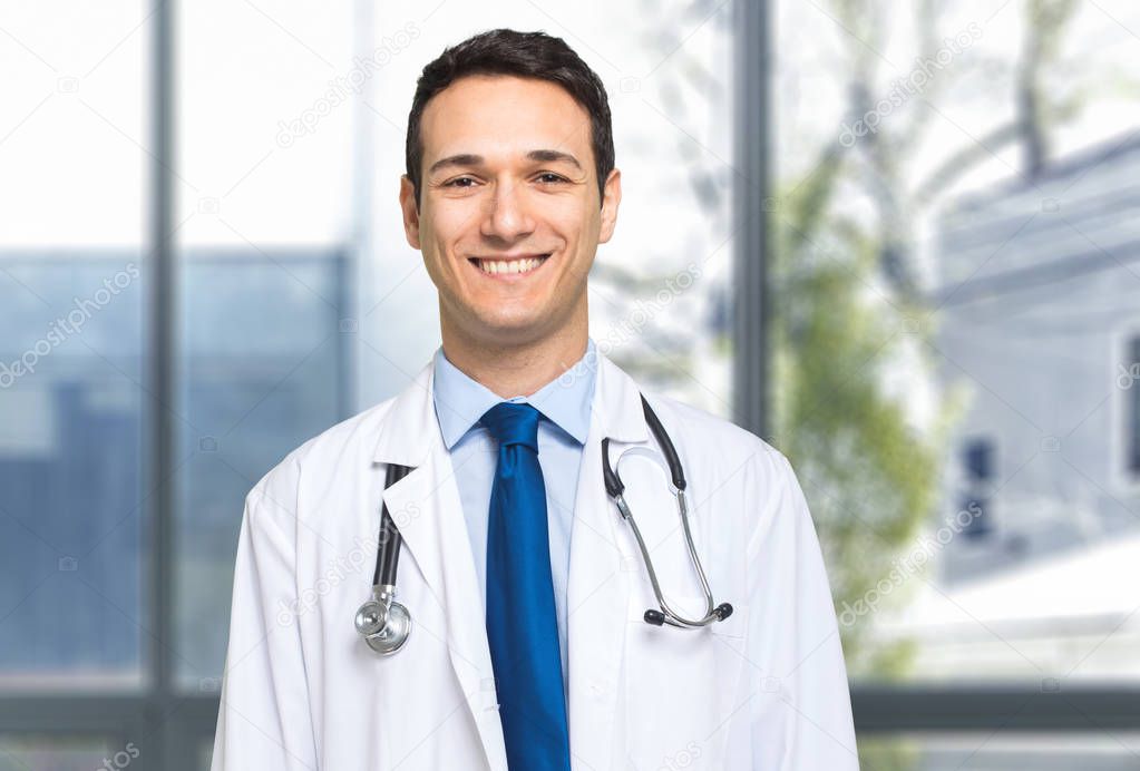 Male doctor smiling