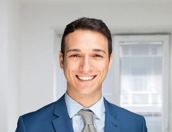 Happy businessman in his office — Stock Photo, Image