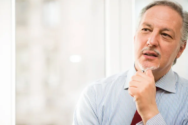 Businessman thinking about something — Stock Photo, Image