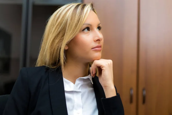 Young businesswoman in office — Stock Photo, Image