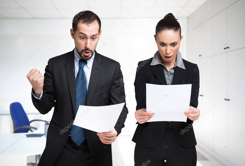 Business people looking at a documents