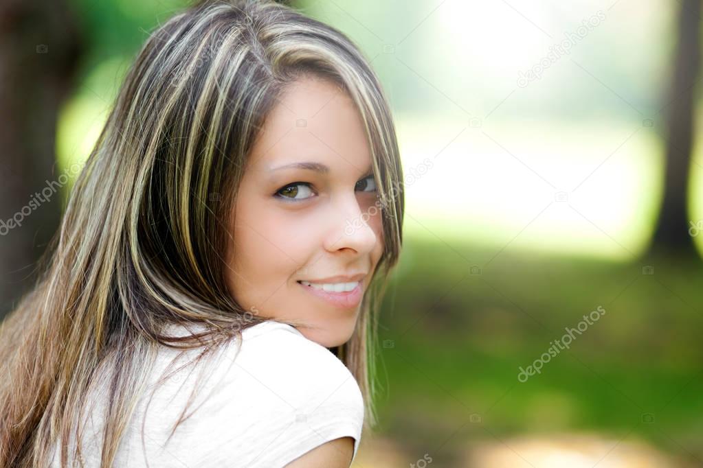 Beautiful woman at park