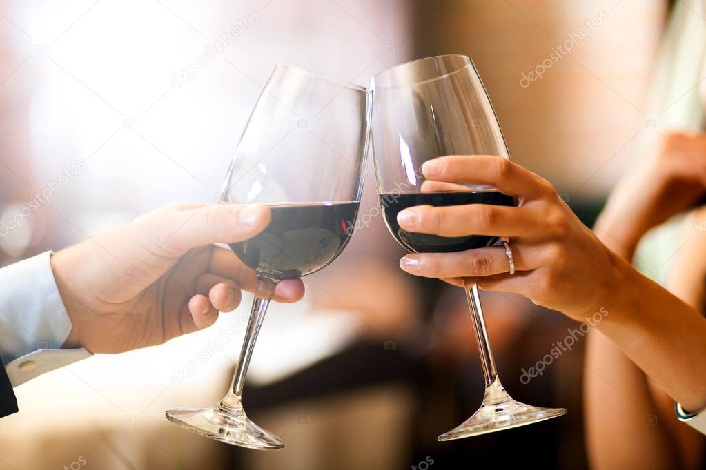 Couple toasting wineglasses