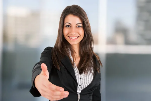 Businesswoman offering an handshake — Stock Photo, Image