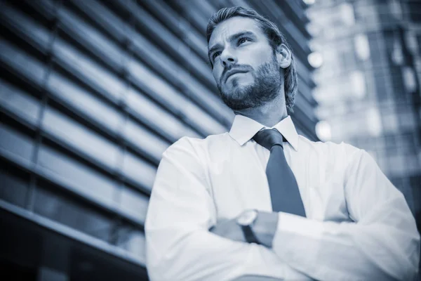 Handsome businessman in city — Stock Photo, Image