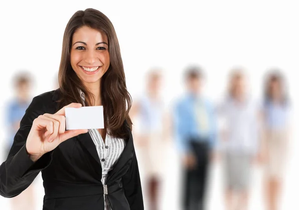 Business woman showing a business card — стоковое фото