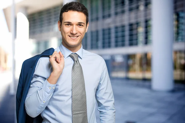 Handsome businessman in the city — Stock Photo, Image