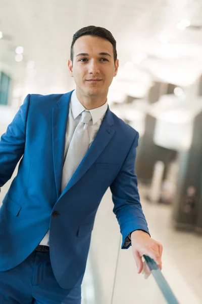 Handsome businessman in airport — Stock Photo, Image