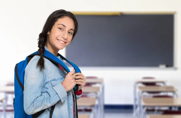 Cute student in her classroom — Stock Photo, Image