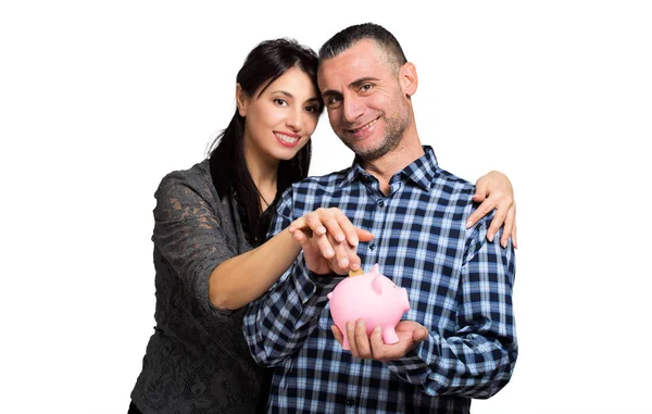 Manželský pár se drží prasátko — Stock fotografie