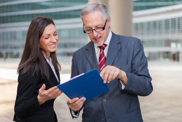 Business people reading some documents — Stock Photo, Image