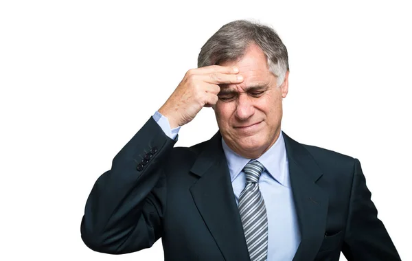 Senior businessman having a headache Stock Photo