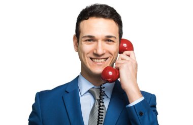 Retro telefonda konuşurken işadamı 