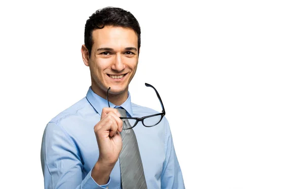 Jóképű üzletember gazdaság szemüveg — Stock Fotó