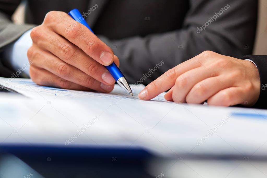 business people working with document