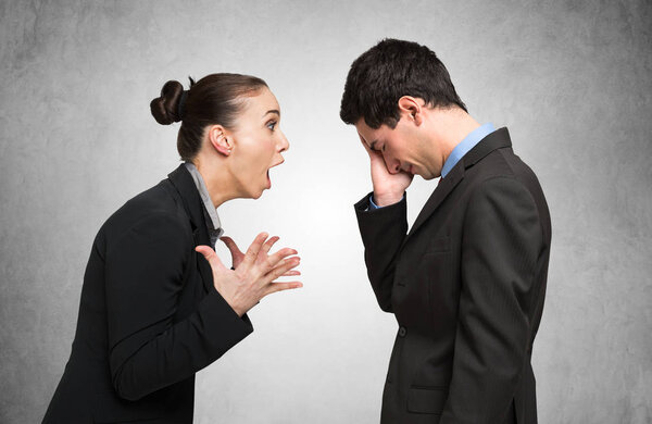 Angry woman shouting to man