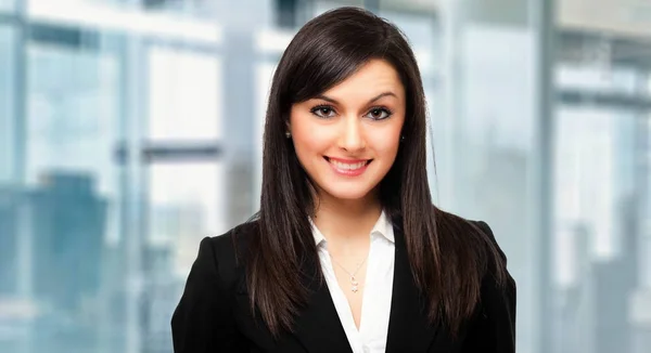 Young businesswoman in office — Stock Photo, Image