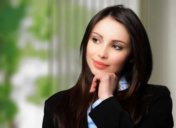 Young businesswoman in office — Stock Photo, Image