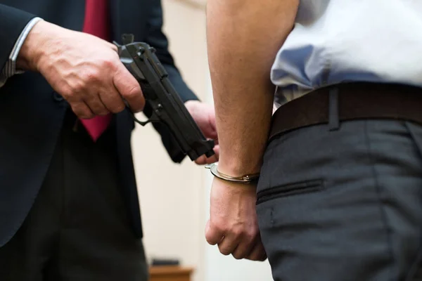 Agent arresting a businessman — Stock Photo, Image