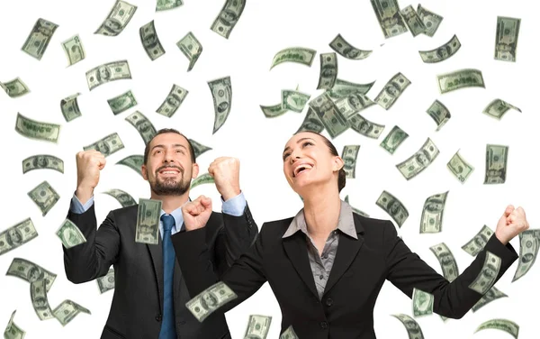 Gente de negocios disfrutando de lluvia de dinero —  Fotos de Stock