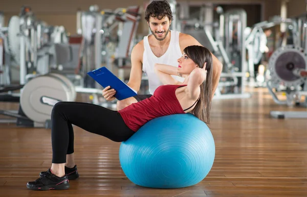 Woman Using Fitness Ball Work Out Personal Trainer — Stock Photo, Image