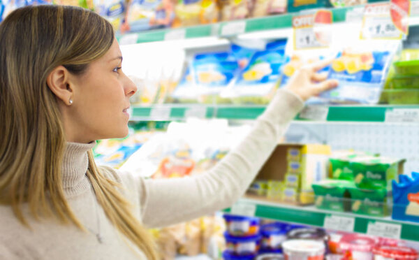 Woman shopping at the supermarket