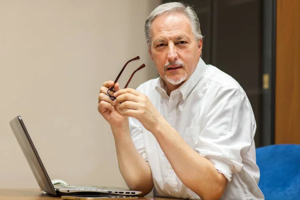 Manager relaxing himself in office — Stock Photo, Image