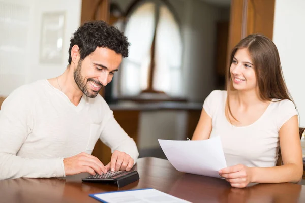 Happy Couple Calculating Expenses Together — Stock Photo, Image