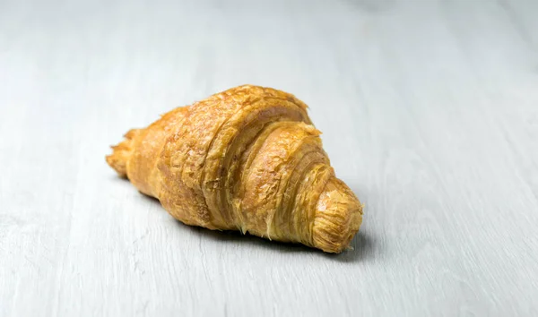 Freshly Plain Croissant Bright Wooden Surface — Stock Photo, Image