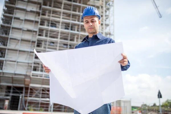 Site Manager Reading Blueprint Front Construction Site — Stock Photo, Image