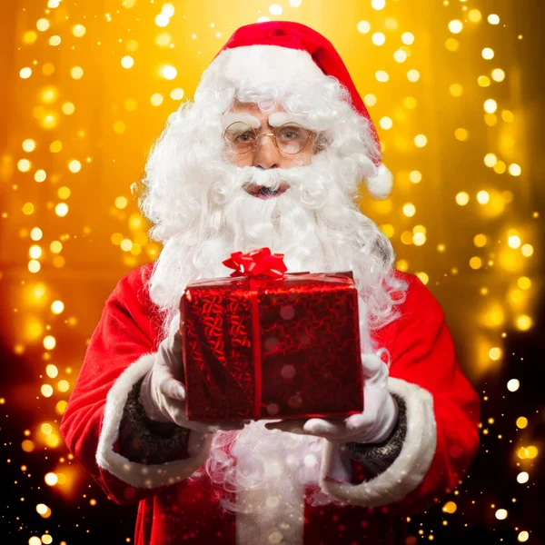 Indoor Portrait Santa Claus Holding Present Stock Photo