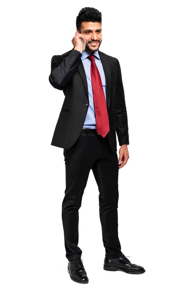 白に対して携帯電話でも魅力的な若いビジネスマン — ストック写真