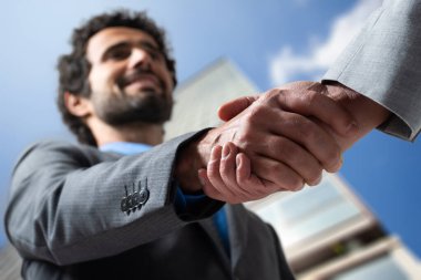 Business agreement, business people shaking hands 