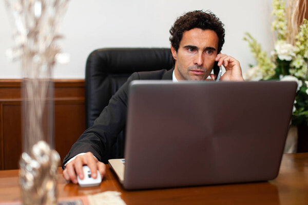 Handsome lawyer at work in his studio