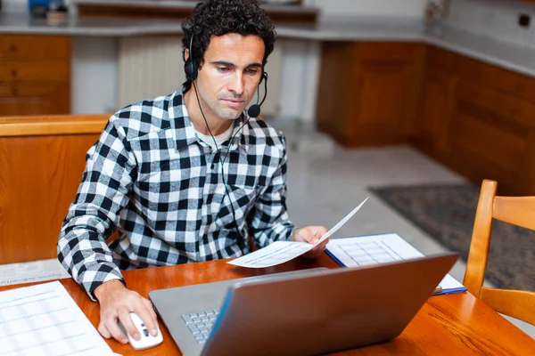 Guy Using Headset Laptop Computer Chatting Internet — Stok fotoğraf