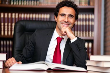 Lawyer portrait in his office  clipart