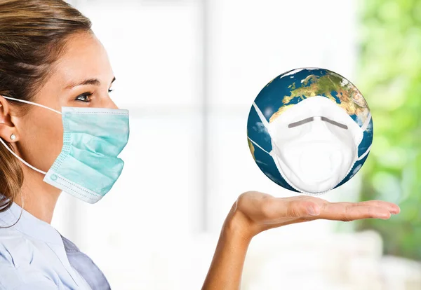 Masked Woman Holding Masked World — Stock Photo, Image