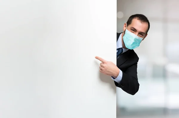 Masked Business Man Showing Blank Sign Panel — Stock Photo, Image