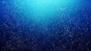 Altın parçacıkları. Doğal yüzen organik parçacıklar üzerinde güzel arka plan. Işıltılı parçacıklar Bokeh ile. Ağır çekim.