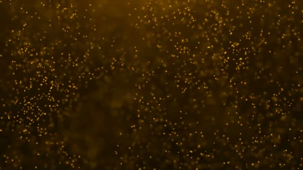 Χρυσό σωματίδια. Φυσικό επιπλέουν οργανικά μόρια σε όμορφο φόντο. Ακτινοβολώντας μόρια με Bokeh. Αργή κίνηση. — Αρχείο Βίντεο
