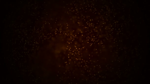 Guld partiklar. Naturlig flytande organiska partiklar på vacker avkopplande bakgrund. Glittrande partiklar med Bokeh. Slow motion. — Stockvideo