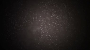 Altın parçacıkları. Arka plan rahatlatıcı doğal yüzen organik parçacıklar üzerinde güzel. Işıltılı parçacıklar Bokeh ile. Ağır çekim.