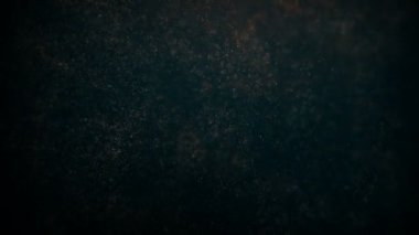 Titreşme parçacıkları, parçacıkların rastgele hareketi. Güzel rahatlatıcı arka plan üzerinde. Volumetrik ışıkta bokeh Ile ışıltılı parçacıklar