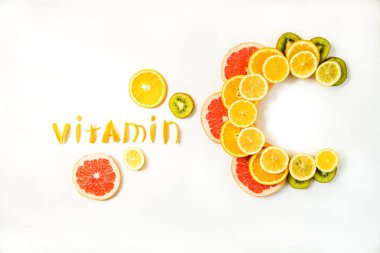 Narenciye meyve yapılan Vitamin C harfleri