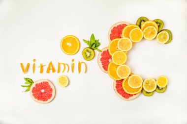 Narenciye meyve yapılan Vitamin C harfleri